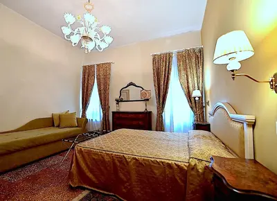 Letto o letti in una camera di Chandeliers Apartment
