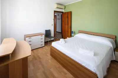Letto o letti in una camera di Appartamento Calmo 2DX