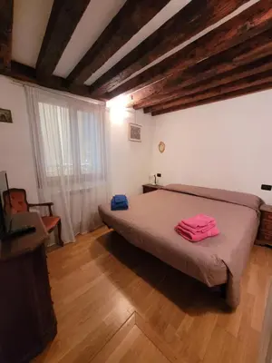 Letto o letti in una camera di Boutique Apartment CA'LIZ