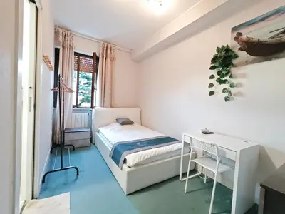 Letto o letti in una camera di Xixi B&B