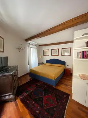 Letto o letti in una camera di Ca' del Drago