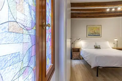 Letto o letti in una camera di Santa Fosca Cozy Apartment
