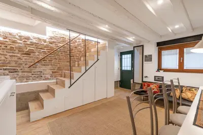 Area soggiorno di Santa Fosca Cozy Apartment