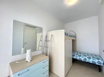 Letto o letti in una camera di Laguna - Carraro Immobiliare - Family Apartments