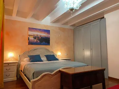 Letto o letti in una camera di Cà di Pizzo di Burano