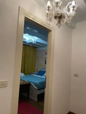 Letto o letti in una camera di Cà di Pizzo di Burano