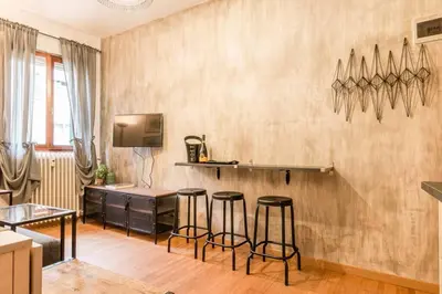 TV o dispositivi per l'intrattenimento presso enJoy Home - Appartamento a due passi dal Teatro Verdi