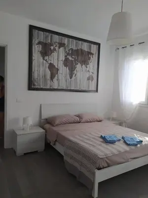 Letto o letti in una camera di Momy House