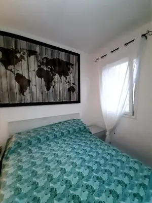 Letto o letti in una camera di Momy House