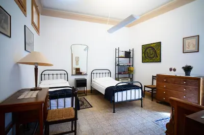 Letto o letti in una camera di Casa dell'Architetto