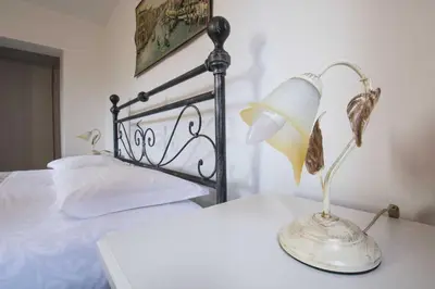 Letto o letti in una camera di Ca' Canciani