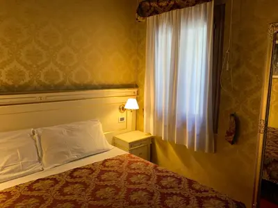 Letto o letti in una camera di CASA MARGOT