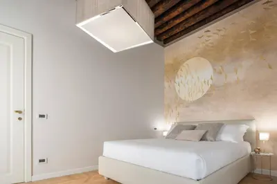 Letto o letti in una camera di San Marco Boutique R&R