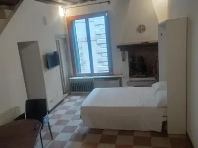 Letto o letti in una camera di Ca’Barbarigo