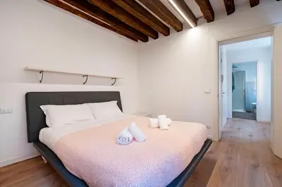 Letto o letti in una camera di Residenza Riccardo