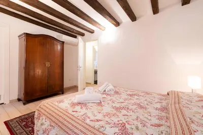 Letto o letti in una camera di San Marco New Romantic