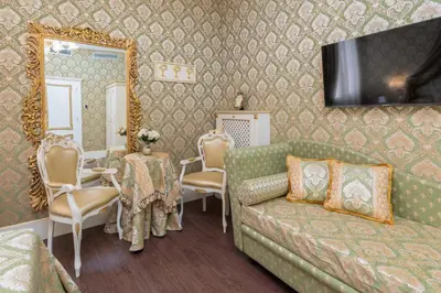 Area soggiorno di La Veneziana Boutique Rooms