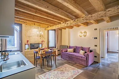 Area soggiorno di Corte Rubbi 8 Luxury Two-bedroom Apartment -Dimora Italia -