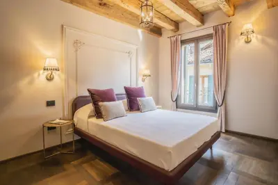 Letto o letti in una camera di Corte Rubbi 8 Luxury Two-bedroom Apartment -Dimora Italia -