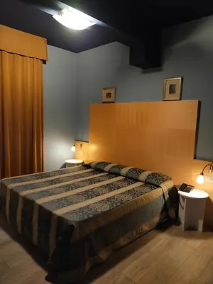 Letto o letti in una camera di LAERTE PALACE HOTEL