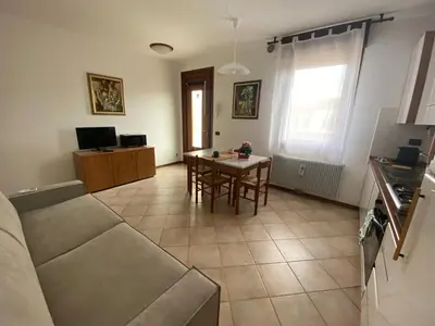 TV o dispositivi per l'intrattenimento presso OTB Italia 2 - Alloggio accogliente tra Venezia e Treviso con 2 Terrazze e Posto auto Coperto