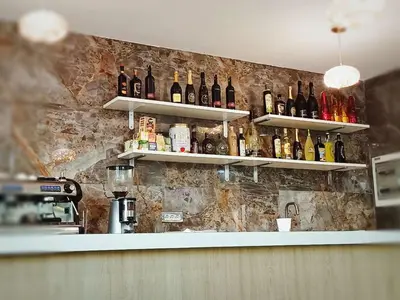 Cucina o angolo cottura di ANMAN HHBB tourism & business rooms