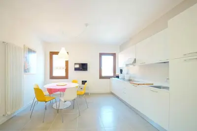Cucina o angolo cottura di DolceVita Apartments N 491 Biennale