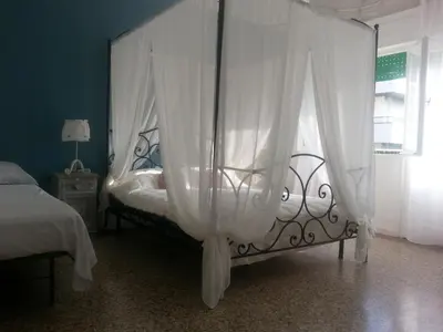 Letto o letti in una camera di To Be Happy in Venice
