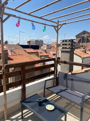 Balcone o terrazza di LAGUNA BLU Camera SOLE con terrazza panoramica in comune