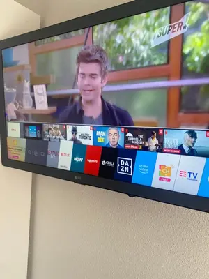 TV o dispositivi per l'intrattenimento presso LAGUNA BLU Camera TRAMONTO con terrazza panoramica in comune