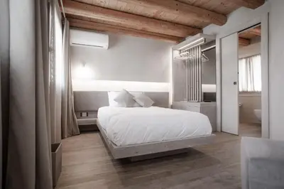 Letto o letti in una camera di Locanda MaMaGiò