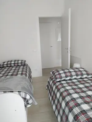 Letto o letti in una camera di Jesolo Appartamenti F2 - Light Blue