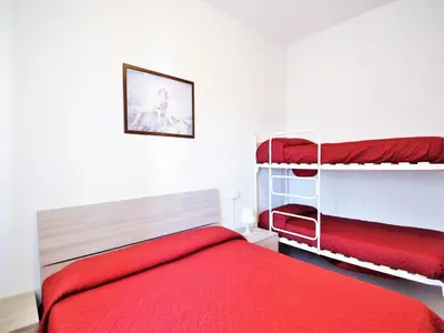 Letto o letti in una camera di Nice holiday home in Rosolina Mare with a terrace