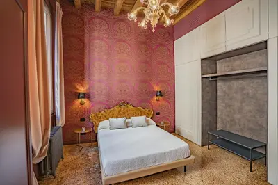 Letto o letti in una camera di Corte Rubbi 7 Deluxe Apartment