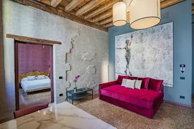 Letto o letti in una camera di Corte Rubbi 7 Deluxe Apartment