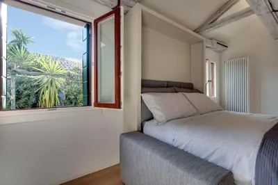 Letto o letti in una camera di Venice Skyline View Studio Apartment M0270428215