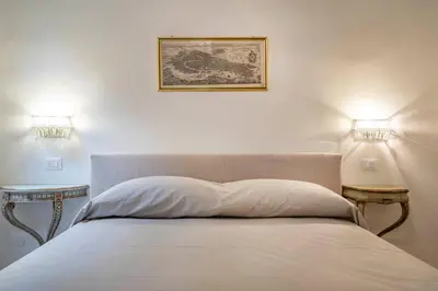 Letto o letti in una camera di Ca’ Anna Rialto Apartment M0270429079