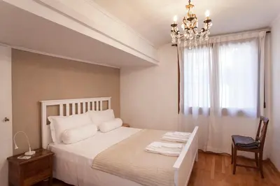 Letto o letti in una camera di Palazzo Valmarana Braga