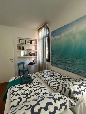 Letto o letti in una camera di L'Altalena di Francesca by Ca Cortigiane