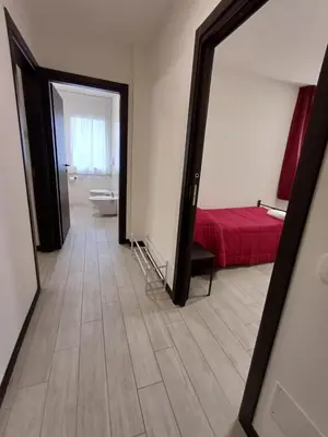 Letto o letti in una camera di Arneroni