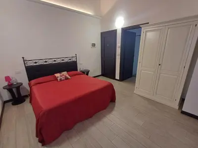 Letto o letti in una camera di Arneroni