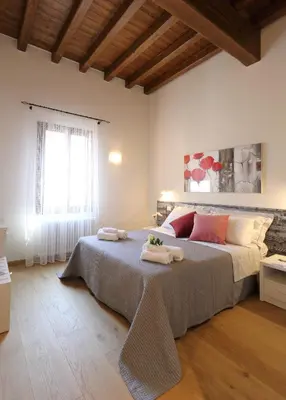 Letto o letti in una camera di Ca' del Pittor Apartments - Tiziano