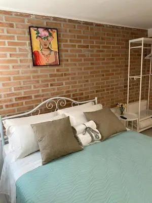 Letto o letti in una camera di LAGUNA BLU Monolocale