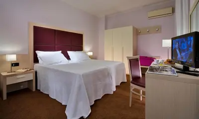 Letto o letti in una camera di Hotel Terme Marco Polo
