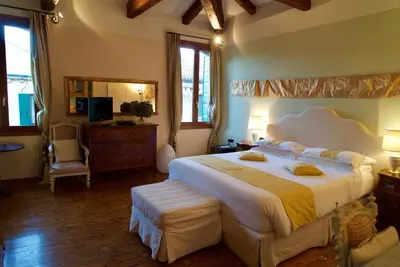 Letto o letti in una camera di La Villeggiatura