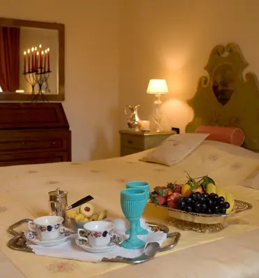 Letto o letti in una camera di La Villeggiatura