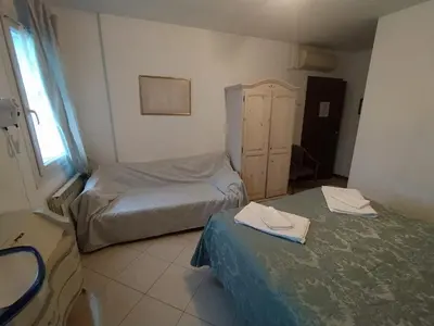 Letto o letti in una camera di Cà Isabella