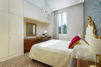 Letto o letti in una camera di Ca' Mainella Grand Canal View 4 bedrooms in Dorsoduro