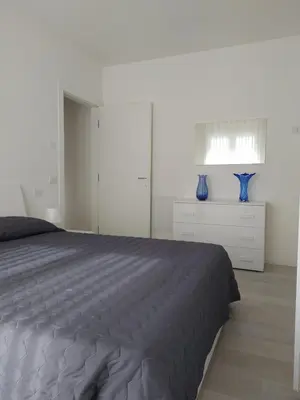 Letto o letti in una camera di Jesolo Appartamenti F2 - Ocean Blue