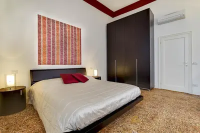 Letto o letti in una camera di Ca’ Amalia San Marco Venetian Apartment M027042932